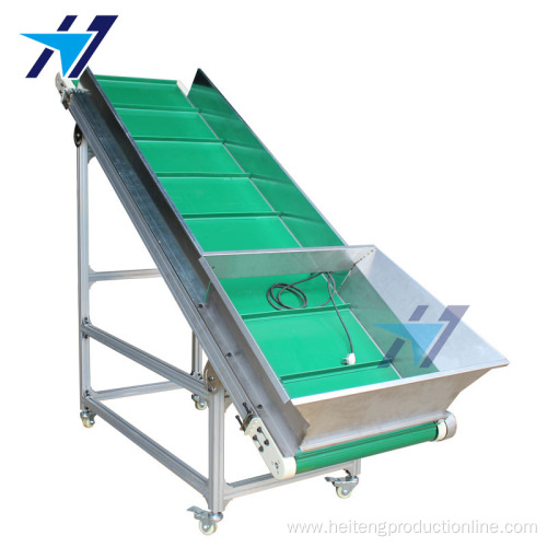 Climbing conveyor with material hopper